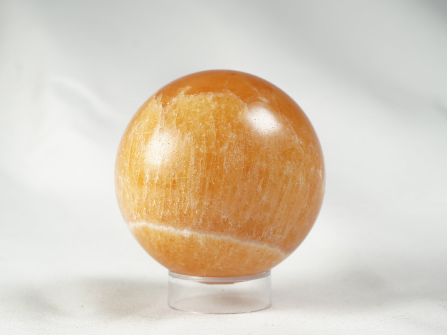Orangencalcit Kugel