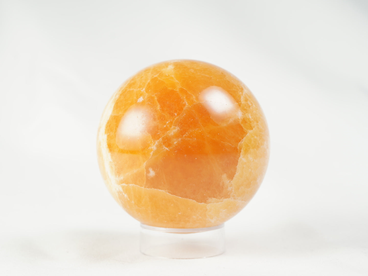 Orangencalcit Kugel