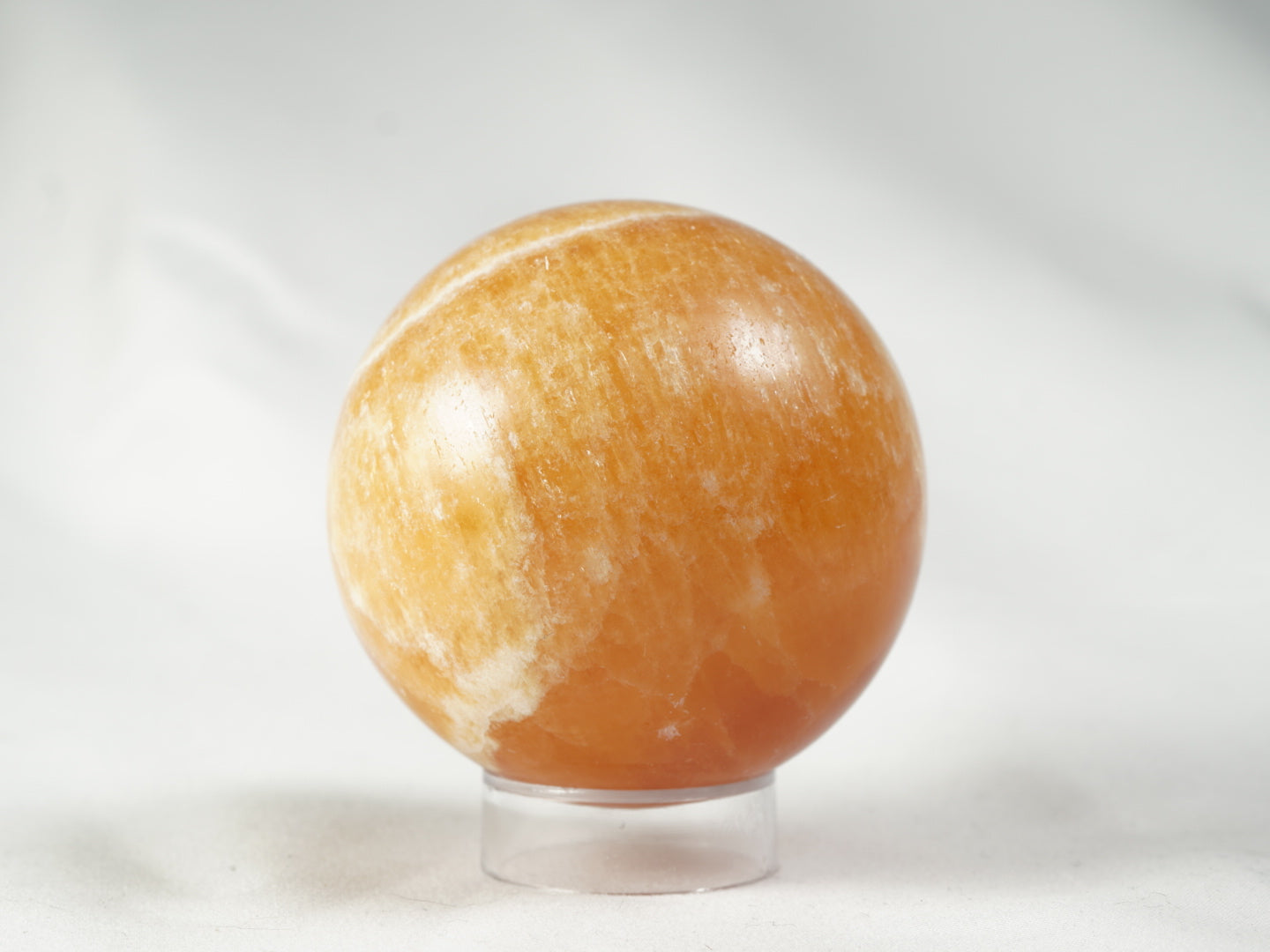 Orangencalcit Kugel