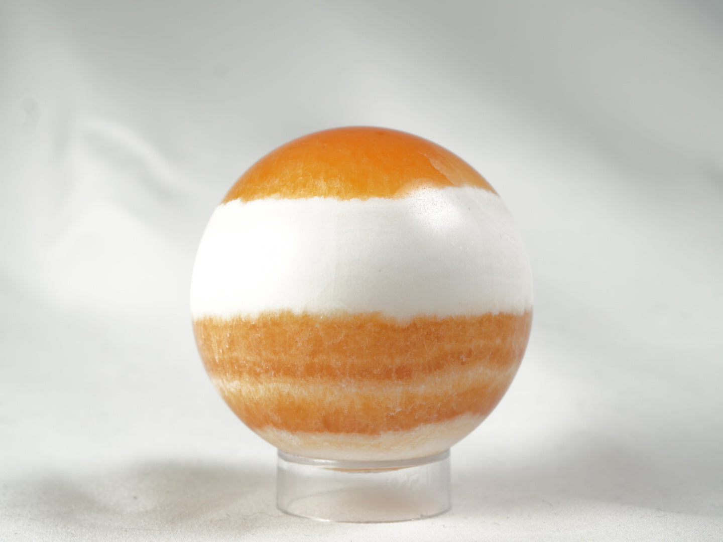 Orangencalcit Kugel