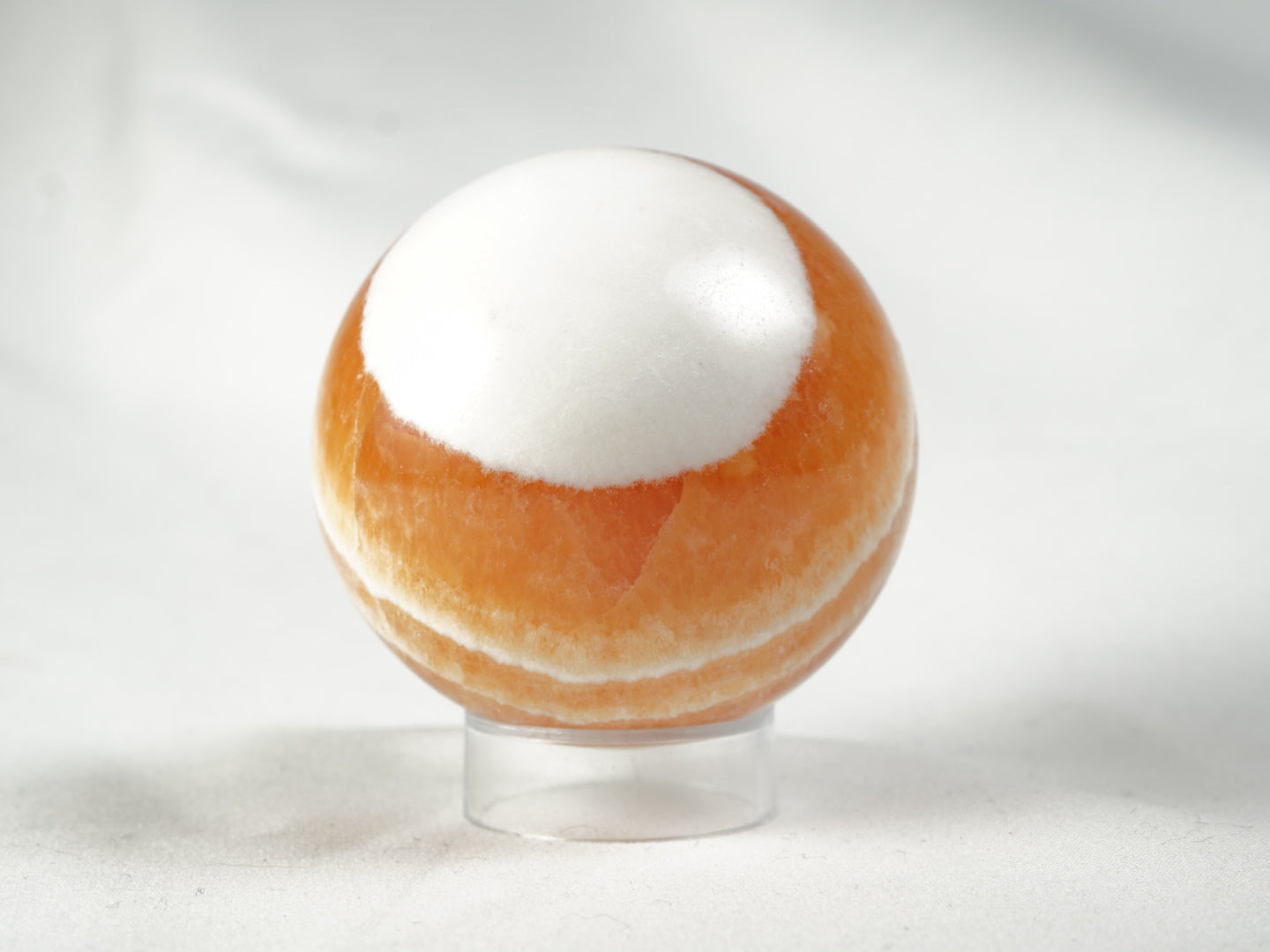 Orangencalcit Kugel