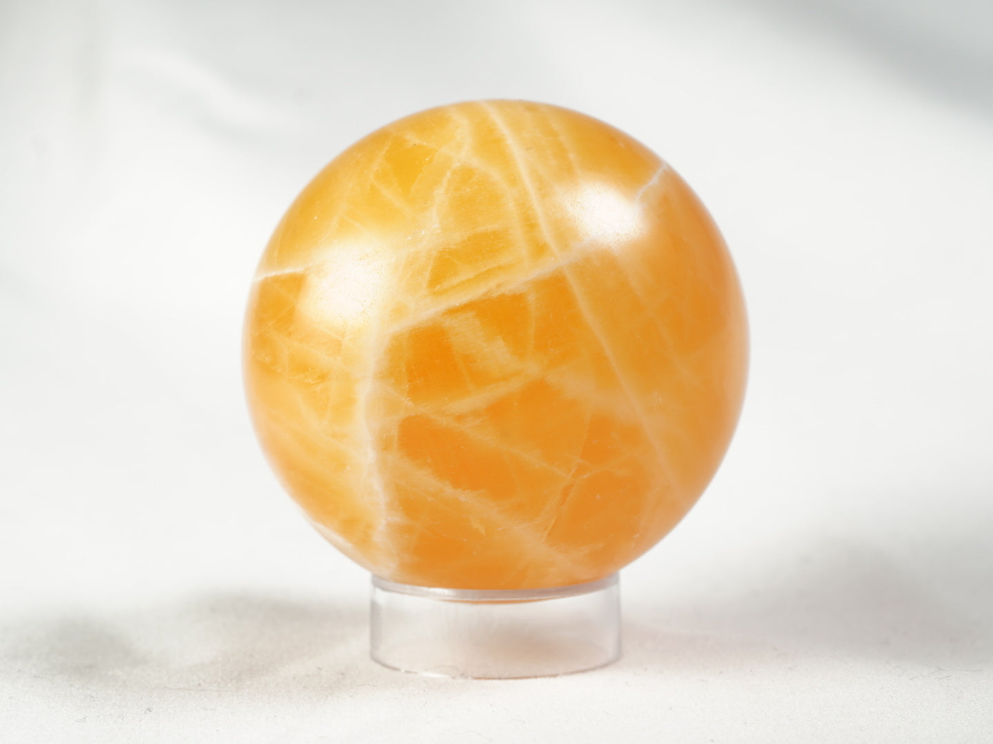 Orangencalcit Kugel